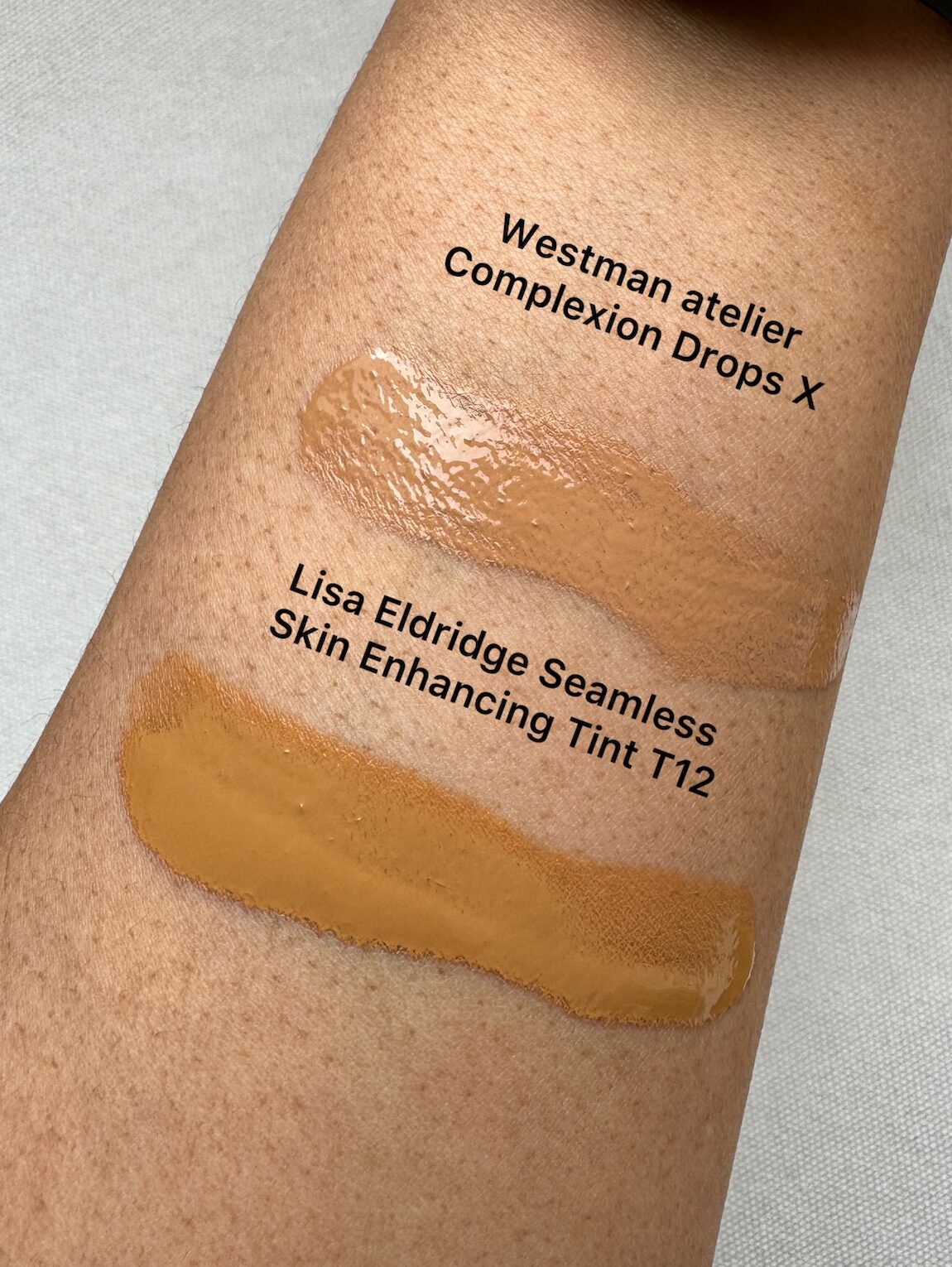 by brie moore
lisa eldridge enhancing skin tint T12,
lisa eldridge skin tint brown skin
westman atelier complexion drops
comparison swatches